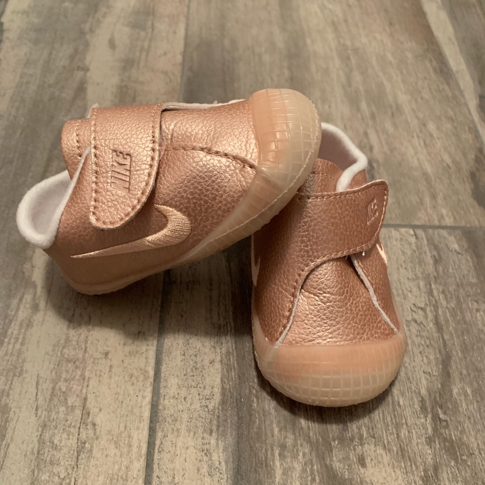 Rose gold infant Nike’s
